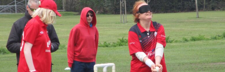 Female cricketer prepares to bowl