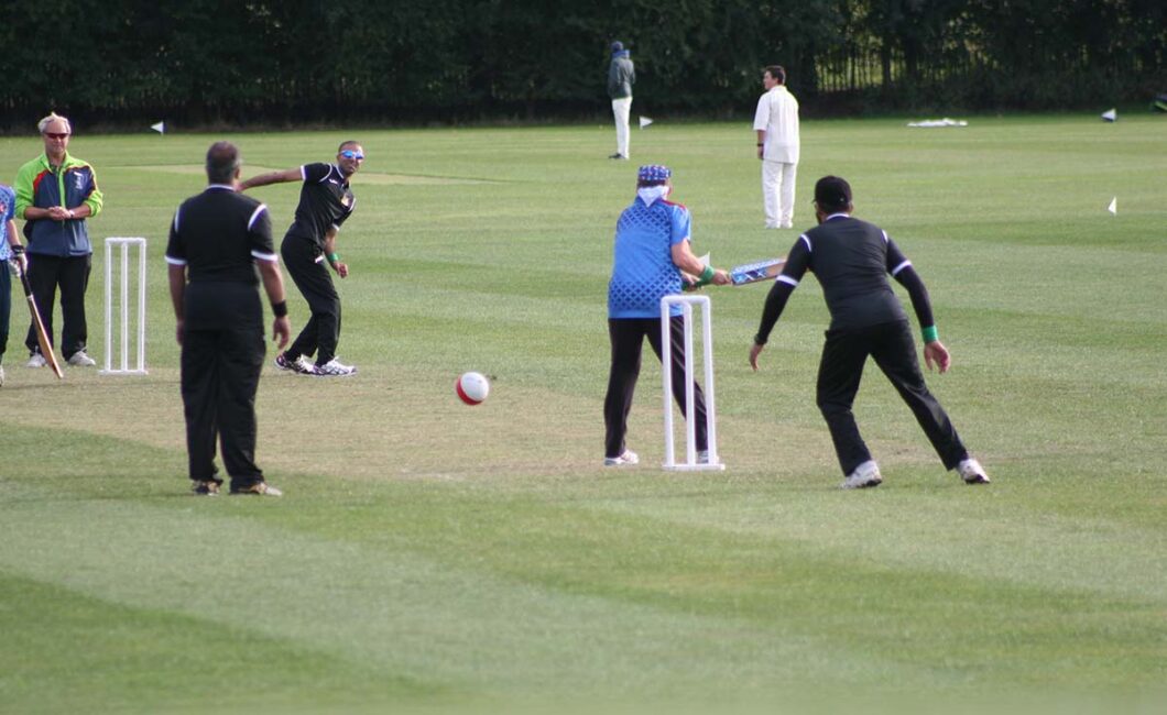 Bradford District Bowler having released the ball with a Kent Spitfires batsman waiting.