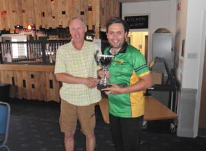 Sam-Hoskin-receives-Berkshires-2022-BCEW-Southern-Regional-League-Trophy-from-John-Garbett
