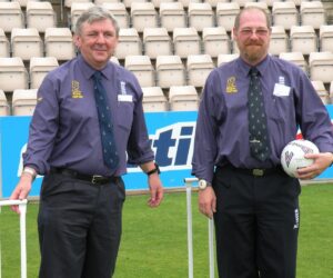 Pete Marshall (On Right) stands with fellow umpire Les Clemenson at the 2010 Primary Club Cup Final